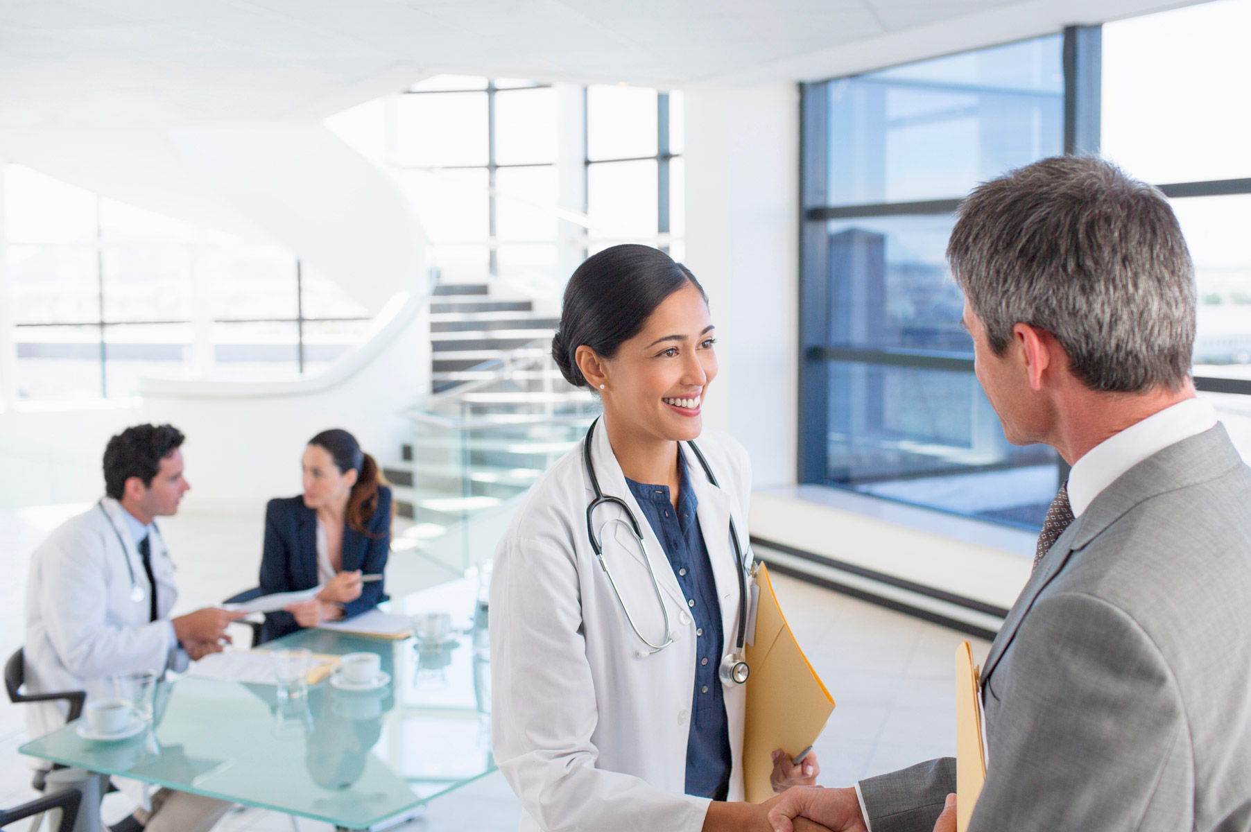 doctor-shakes-hand-with-program-director-post-match