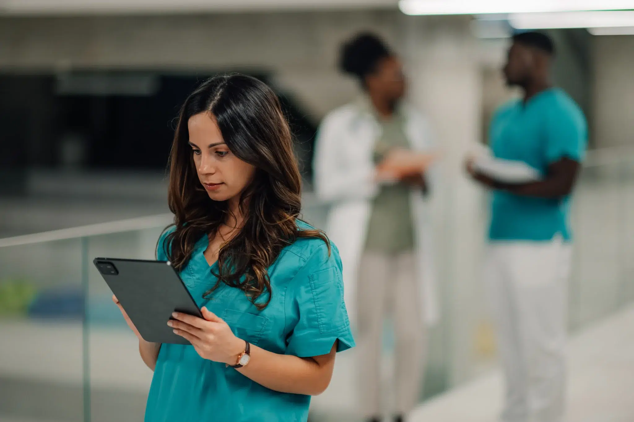 doctor looking at tablet